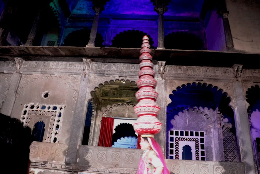 Dancer balancing 11 earthen pots in Bhawai Dance